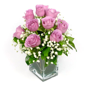 12 violet roses in a glass vase