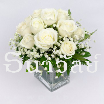 12 white roses in a glass vase